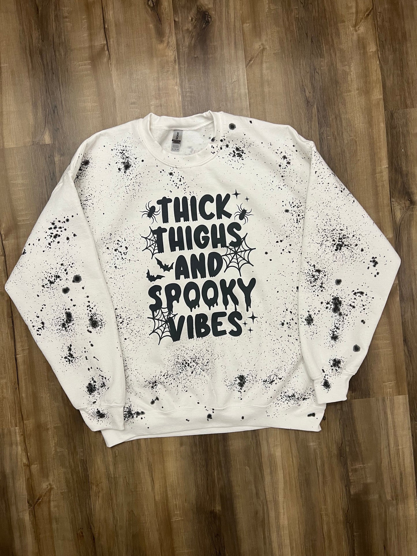 Thick Thighs and Spooky Vibes Paint Splattered Sweatshirt